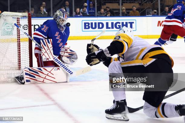 Igor Shesterkin of the New York Rangers makes the first period save on Evan Rodrigues of the Pittsburgh Penguins at Madison Square Garden on March...