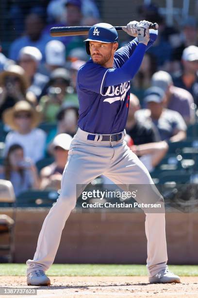 Freddie Freeman of the Los Angeles Dodgers bats against the Colorado Rockies during the MLB spring training game at Salt River Fields at Talking...