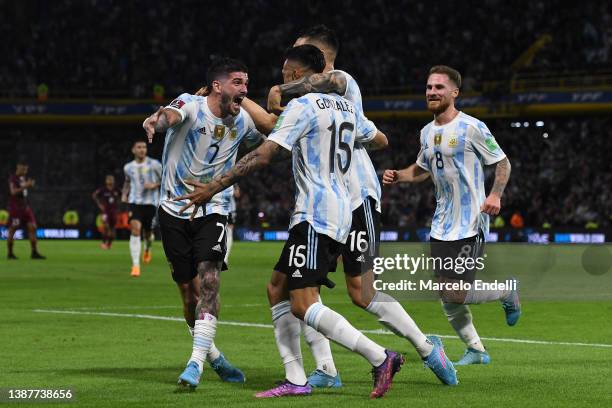 Nicolás Gonzalez of Argentina celebrates with teammates after scoring the first goal of his team during the FIFA World Cup Qatar 2022 qualification...