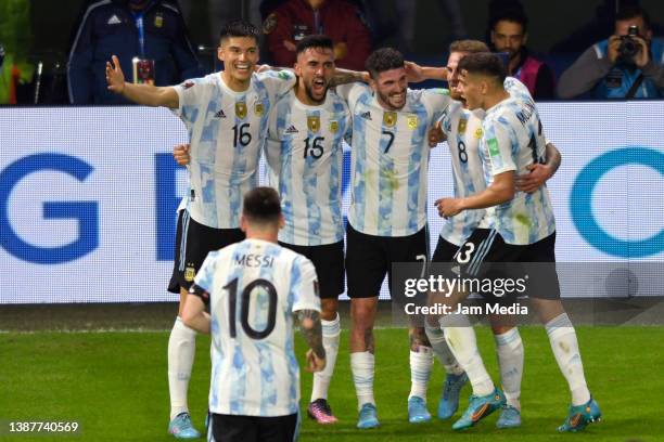 Nicolas Gonzalez of Argentina celebrates with teammates after scoring the first goal of their team during the FIFA World Cup Qatar 2022 qualification...