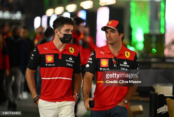 Charles Leclerc of Ferrari and Carlos Sainz of Ferrari leave the paddock after a meeting attended by all of the drivers, the team principals, Stefano...