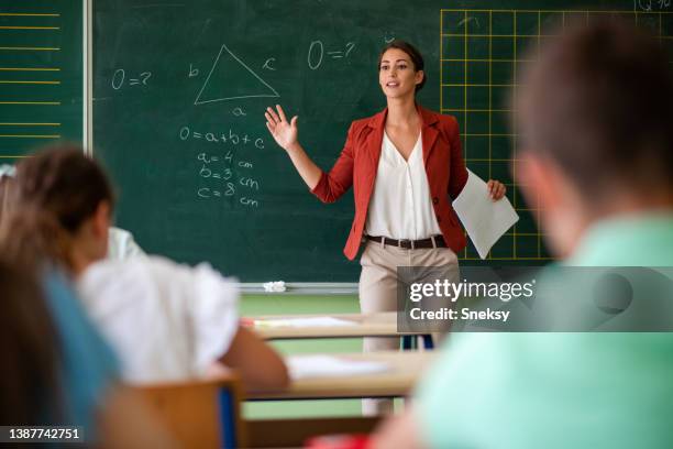 teacher questioning class. - student thinking stock pictures, royalty-free photos & images