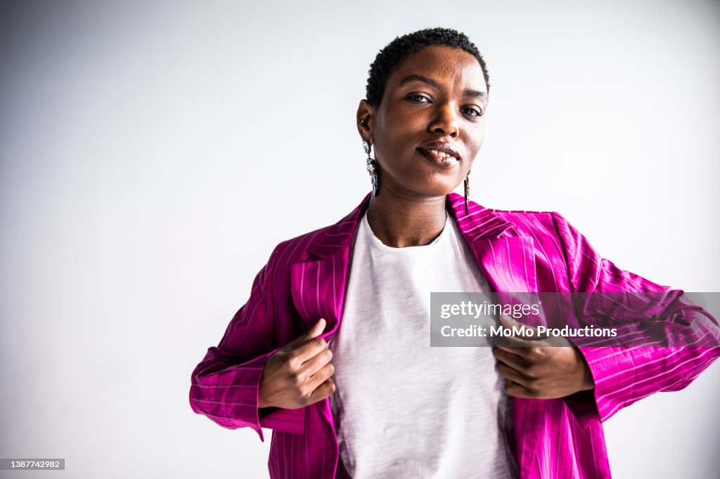 Studio portrait of fashionable young woman