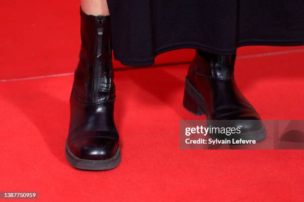 Mouna Soualem, shoe detail, attends the photo call of the closing ceremony of the Series Mania Festival on March 25, 2022 in Lille, France.