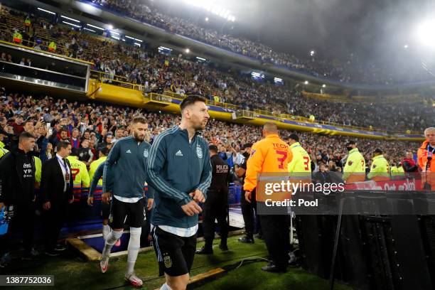 Lionel Messi of Argentina gestures prior to the FIFA World Cup Qatar 2022 qualification match between Argentina and Venezuela at Estadio Alberto J....