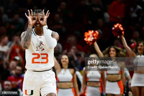 Kameron McGusty of the Miami Hurricanes celebrates after a three-point basket against the Iowa State Cyclones during the first half in the Sweet...