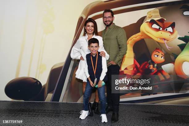 Ada Nicodemou and Adam Rigby pose alongside Ada's son Johnas Xipolitas during The Bad Guys Sydney premiere on March 26, 2022 in Sydney, Australia.