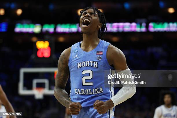 Caleb Love of the North Carolina Tar Heels reacts in the second half of the game against the UCLA Bruins in the Sweet Sixteen round game of the 2022...