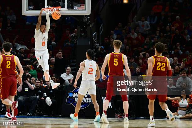 Jordan Miller of the Miami Hurricanes dunks the ball against the Iowa State Cyclones during the second half in the Sweet Sixteen round game of the...