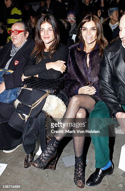 Julia Restoin-Roitfeld and Carine Roitfeld attend the Alexander Wang fall 2012 fashion show at Pier 94 on February 11, 2012 in New York City.