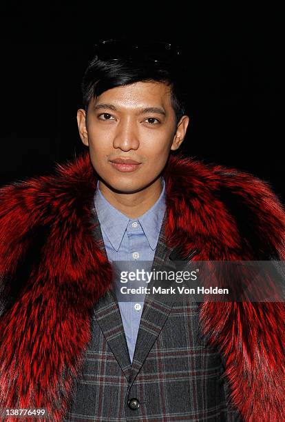Fashion blogger Bryan Boy attends the Alexander Wang fall 2012 fashion show at Pier 94 on February 11, 2012 in New York City.