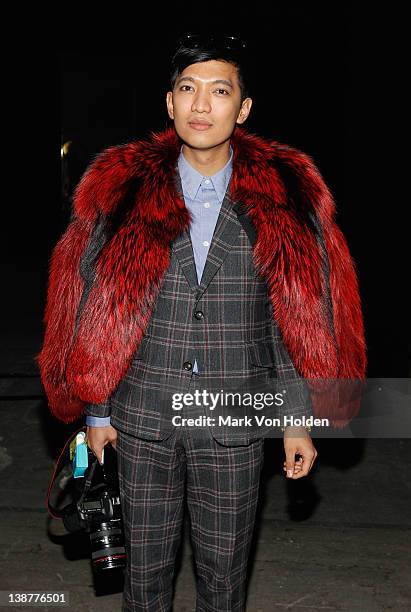 Fashion blogger Bryan Boy attends the Alexander Wang fall 2012 fashion show at Pier 94 on February 11, 2012 in New York City.