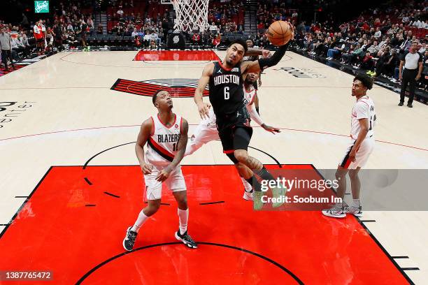 Kenyon Martin Jr. # 6 of the Houston Rockets dunks the ball past Ben McLemore of the Portland Trail Blazers during the second half at Moda Center on...