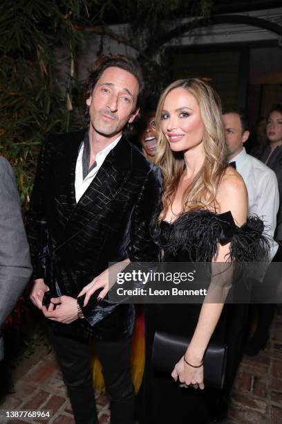 Adrien Brody and Georgina Chapman attend the CAA pre-Oscar party at San Vicente Bungalows on March 25, 2022 in West Hollywood, California.