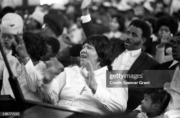 The African-American congregation of a Pentecostal church celebrate Easter in the South End neighborhood, Boston, Massachusetts, 1973.