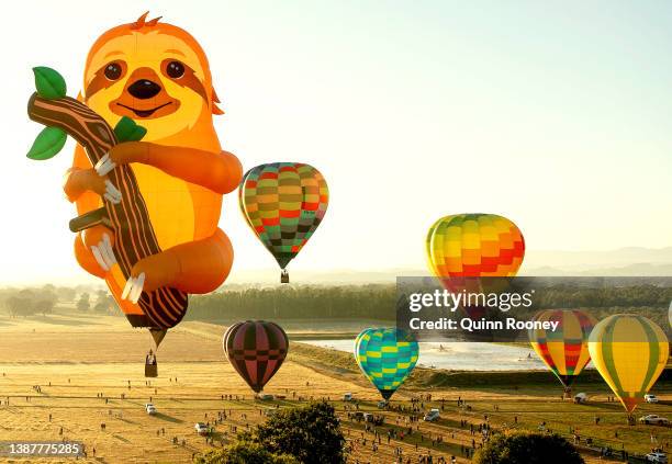 Hot air balloons take flight from Brown Brothers Milawa Airfield on March 26, 2022 in Wangaratta, Australia. The King Valley Balloon Fiesta runs from...