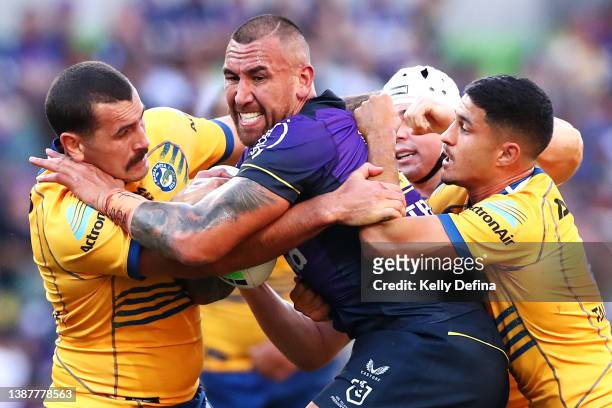 Nelson Asofa-Solomona of the Storm is tackled during the round three NRL match between the Melbourne Storm and the Parramatta Eels at AAMI Park, on...