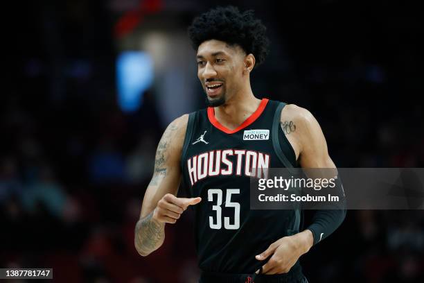Christian Wood of the Houston Rockets reacts during the first half against the Portland Trail Blazers at Moda Center on March 25, 2022 in Portland,...