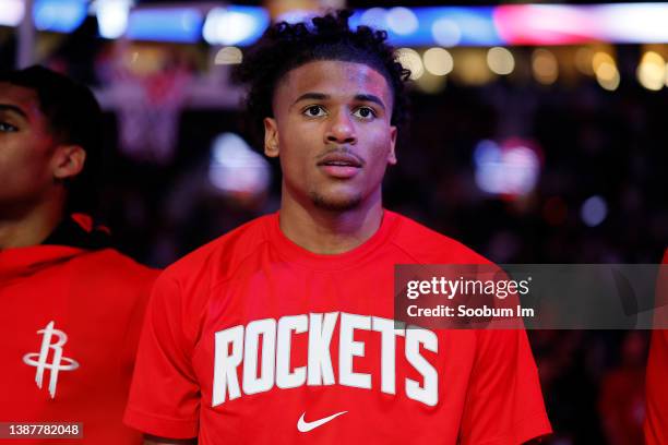 Jalen Green of the Houston Rockets stands during the national anthem before the game against the Portland Trail Blazers at Moda Center on March 25,...