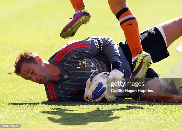 Mark Paston of the Phoenix makes a save during the round 19 A-League match between Wellington Phoenix and Brisbane Roar at Westpac Stadium on...