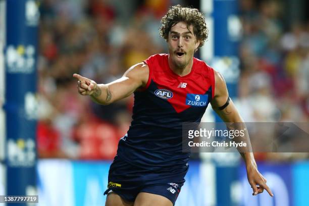 Luke Jackson of the Demons celebrates a goal during the round two AFL match between the Gold Coast Suns and the Melbourne Demons at Metricon Stadium...