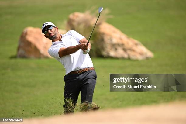 Pablo Larrazabal of Spain plays his approach shot on the fourth hole during Day Three of the Commercial Bank Qatar Masters at Doha Golf Club on March...