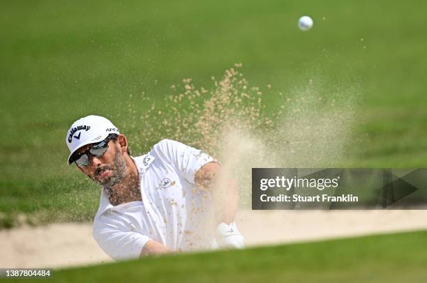 Pablo Larrazabal of Spain plays his bunker shot on the fourth hole during Day Three of the Commercial Bank Qatar Masters at Doha Golf Club on March...