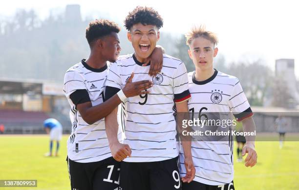 Paris-Josua Brunner of Germany celebrates the third goal and 3-1 with Charles Herrmannn of Germany and Maximilian Hennig of Germany during the...
