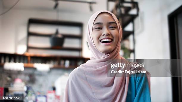 asian happy women hijab - indonesia independence stock pictures, royalty-free photos & images