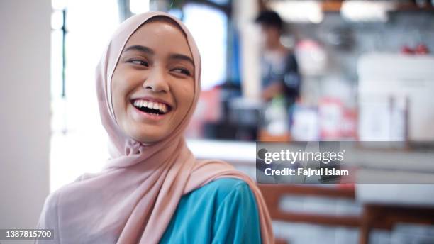 asian happy women hijab - indonesian ethnicity foto e immagini stock