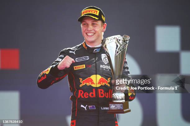 Race winner Liam Lawson of New Zealand and Carlin celebrates on the podium during the Round 2:Jeddah Sprint Race of the Formula 2 Championship at...