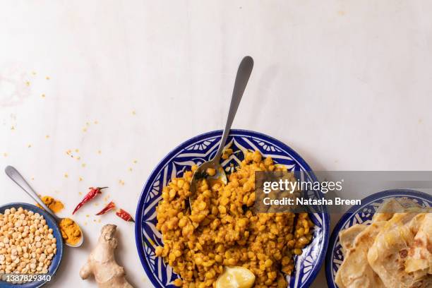 traditional indian yellow pea food dal with roti bread - dal stock pictures, royalty-free photos & images