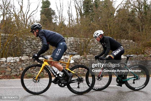 Richard Carapaz of Ecuador and Team INEOS Grenadiers and Sergio Andres Higuita Garcia of Colombia and Team Bora - Hansgrohe compete in the breakaway...
