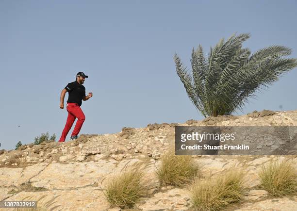 Romain Langasque of France runs on the 16th hole during Day Three of the Commercial Bank Qatar Masters at Doha Golf Club on March 26, 2022 in Doha,...