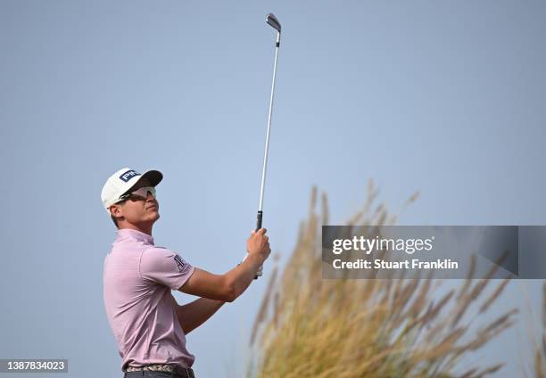 Wilco Nienhaber of South Afric plays his tee shot on the 16th hole during Day Three of the Commercial Bank Qatar Masters at Doha Golf Club on March...