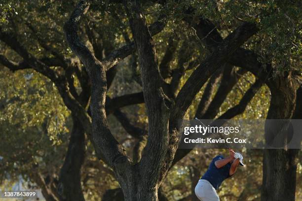 Jon Rahm of Spain plays a shot on the sixth hole in his Round of 16 match against Brooks Koepka of the United States on the fourth day of the World...