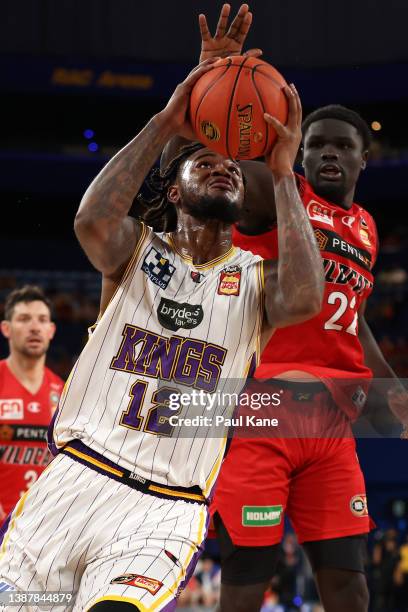 Jarell Martin of the Kings goes to the basket against Majok Majok of the Wildcats during the round 17 NBL match between the Perth Wildcats and Sydney...