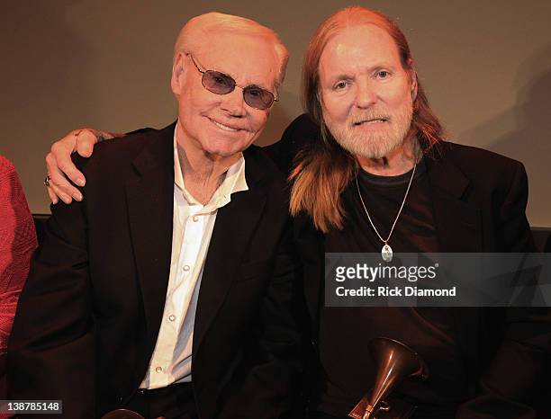 Honorees George Jones and Gregg Allman chat during The 54th Annual GRAMMY Awards - Special Merit Awards Ceremony And Nominee Reception at The...