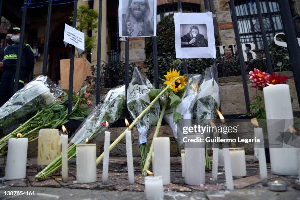 Lights and flowers that were placed by fans of U.S. Band Foo Fighters stand outside Casa Medina Hotel where the band's drummer Taylor Hawkins was...