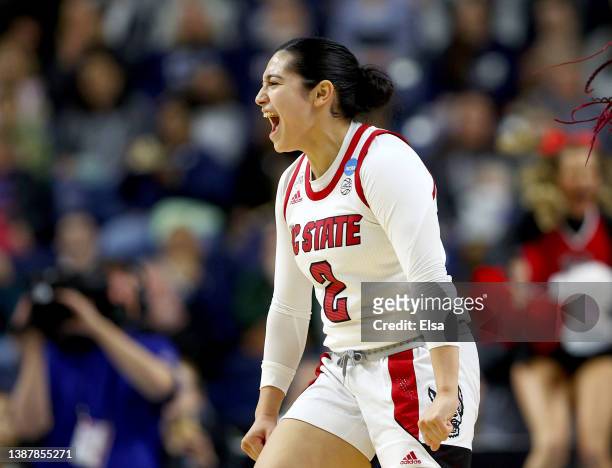 Raina Perez of the NC State Wolfpack celebrates the win over the Notre Dame Fighting Irish during the Sweet Sixteen round of the NCAA Women's...