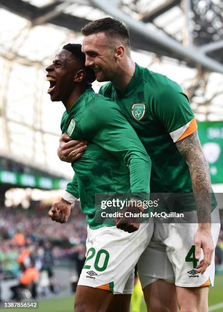 Chiedozie Ogbene celebrates with teammate Shane Duffy of Republic Of Ireland after scoring their team's first goal during the International Friendly...