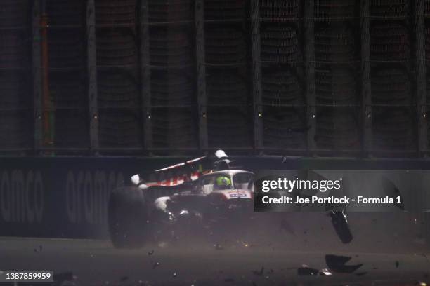 Mick Schumacher of Germany driving the Haas F1 VF-22 Ferrari crashes during qualifying ahead of the F1 Grand Prix of Saudi Arabia at the Jeddah...