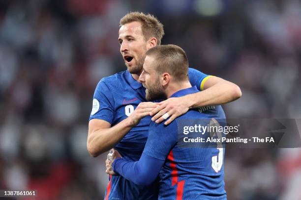 Luke Shaw celebrates with Harry Kane of England after scoring their team's first goal during the International Friendly match between England and...