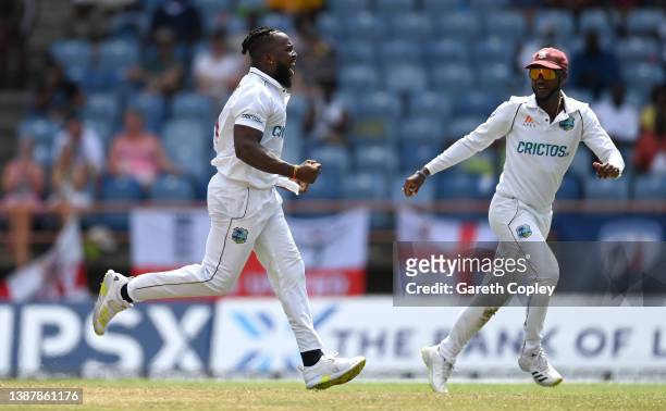 Kyle Mayers of the West Indies celebrates with captain Kraigg Brathwaite after dismissing Ben Stokes of England during day three of the 3rd Test...