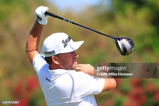 Graeme McDowell of Northern Ireland plays his shot from the 12th tee during the third round of the Corales Puntacana Championship at the Corales Golf...