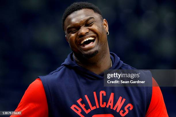 Zion Williamson of the New Orleans Pelicans stands on the court prior to the start of an NBA game against the San Antonio Spurs at Smoothie King...