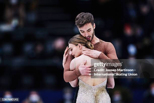 Gabriella Papadakis and Guillaume Cizeron of France react in the Ice Dance Free Dance during day 4 of the ISU World Figure Skating Championships at...