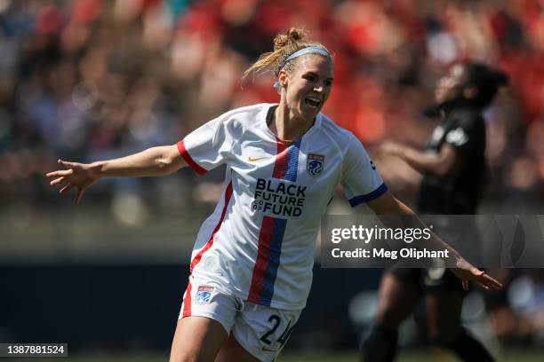 Veronica Latsko of OL Reign celebrates her goal in the first half against the Angel City FC during the 2022 NWSL Challenge Cup at Titan Stadium on...