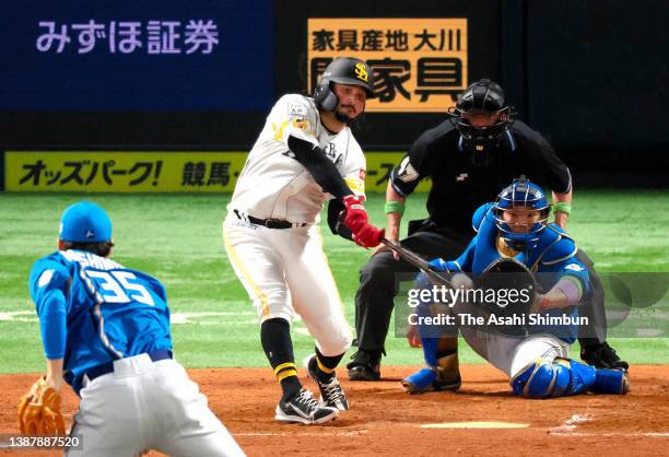 Freddy Galvis of Fukuoka SoftBank Hawks hits a grand slam in the 8th inning against Hokkaido Nippon-Ham Fighters at Fukuoka PayPay Dome on March 25,...