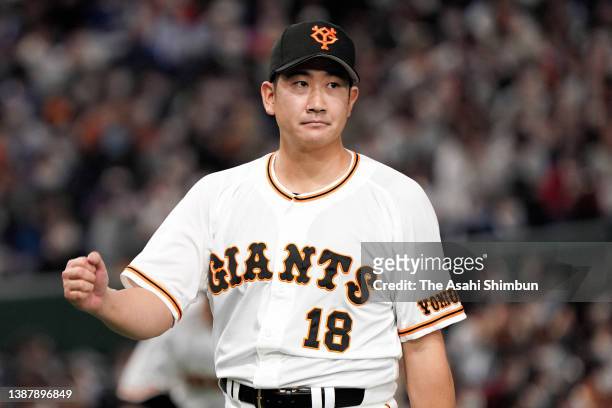 Tomoyuki Sugano of the Yomiuri Giants reacts after the 2nd inning against Chunichi Dragons at Tokyo Dome on March 25, 2022 in Tokyo, Japan.